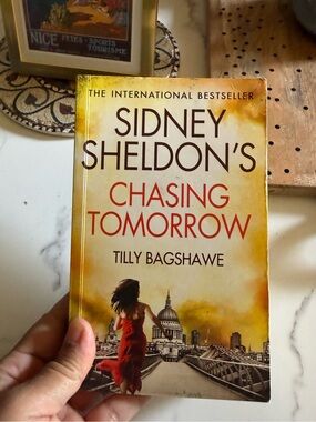 Sidney Sheldon's Chasing Tomorrow by Tilly Bagshawe - Yellow & Red Cover